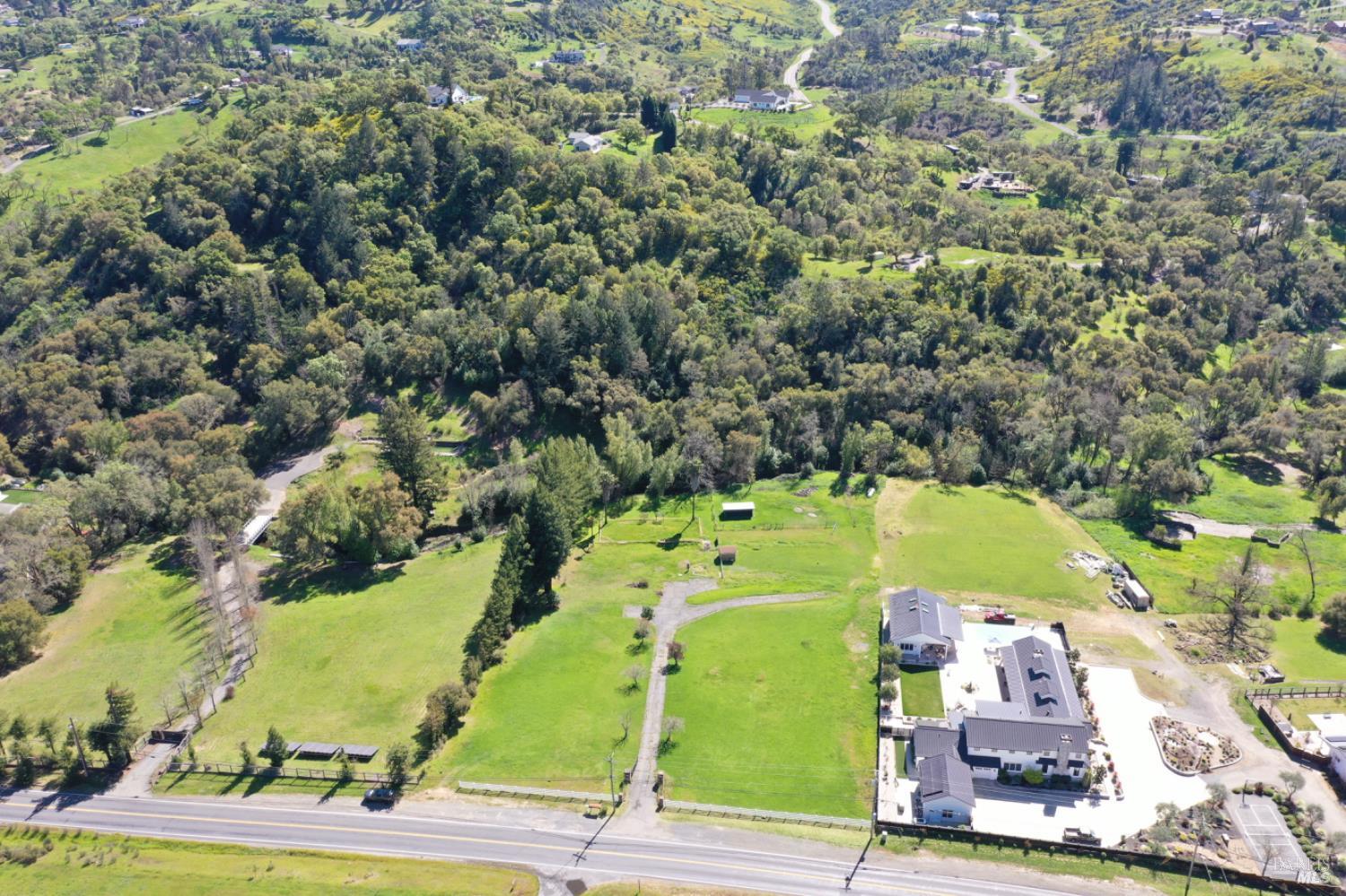 1360 Riebli Road Santa Rosa, CA 95404 - Photo 23 of 55 an aerial view of a houses with a yard