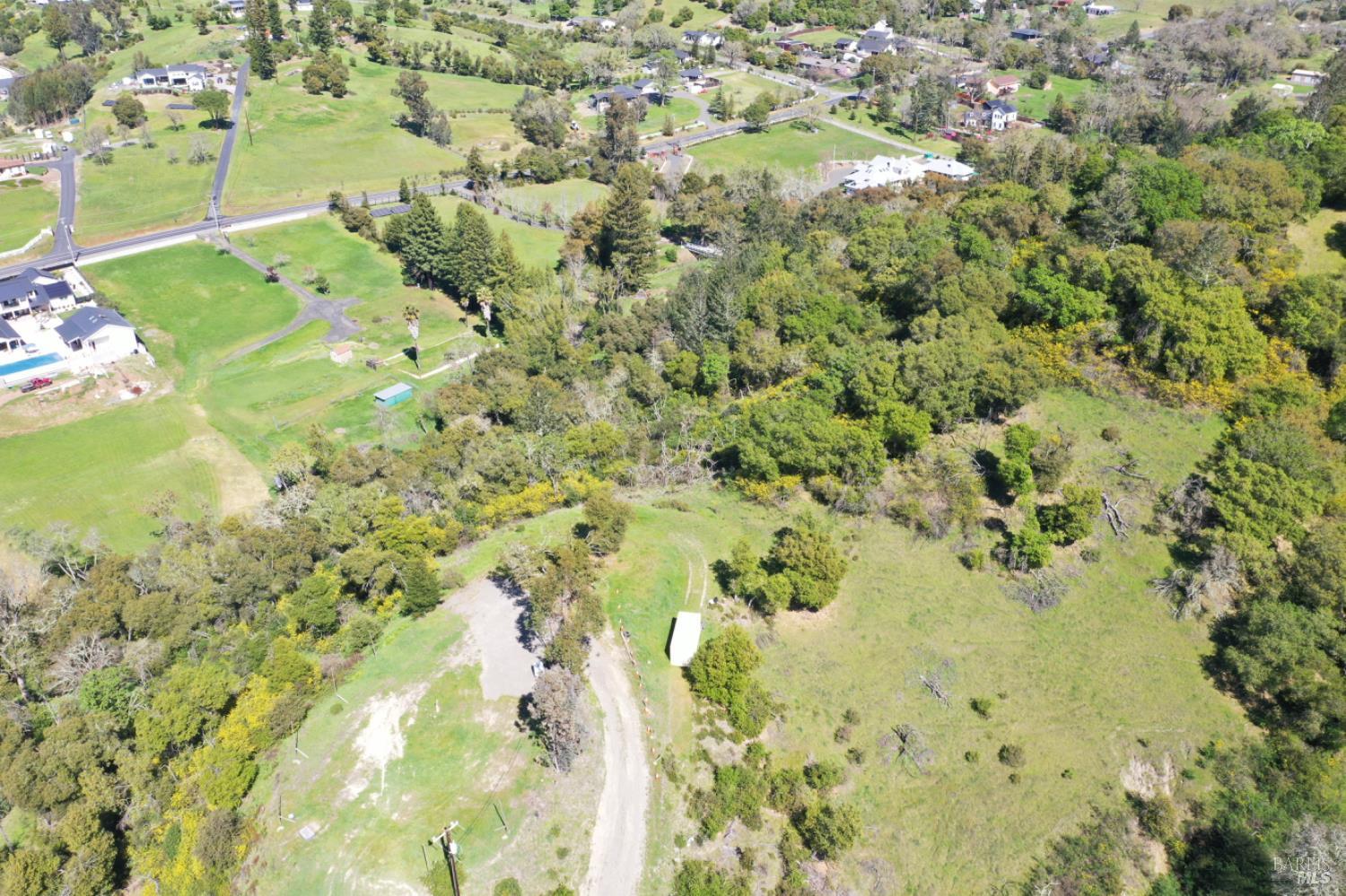 1360 Riebli Road Santa Rosa, CA 95404 - Photo 27 of 55 a view of a yard with swimming pool