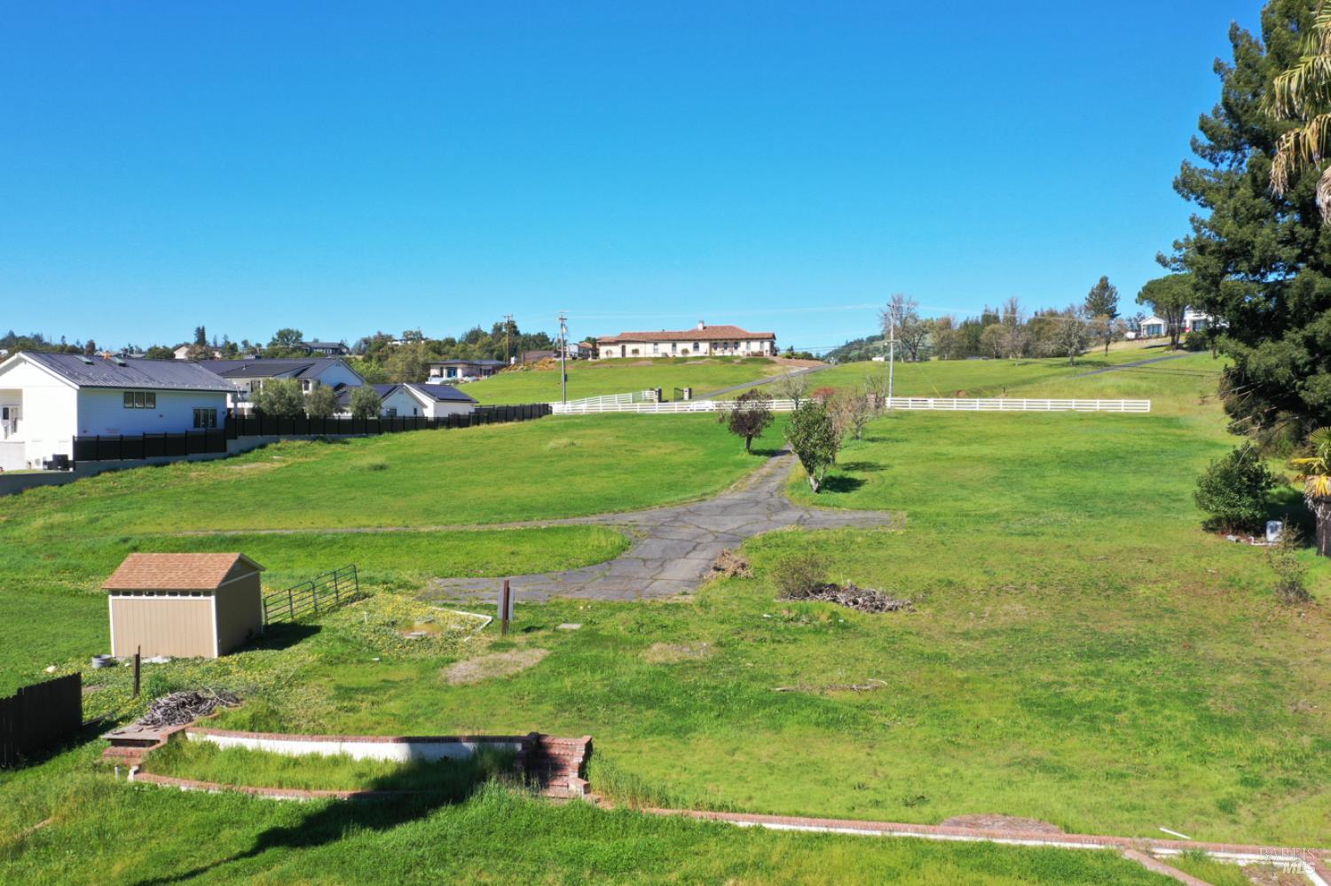 1360 Riebli Road Santa Rosa, CA 95404 - Photo 30 of 55 a view of a golf course with a garden
