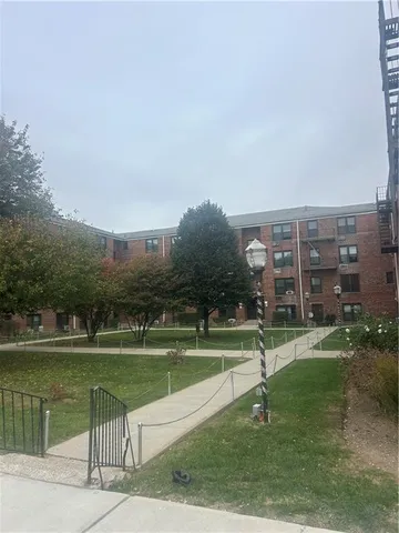 a view of a lake with a yard