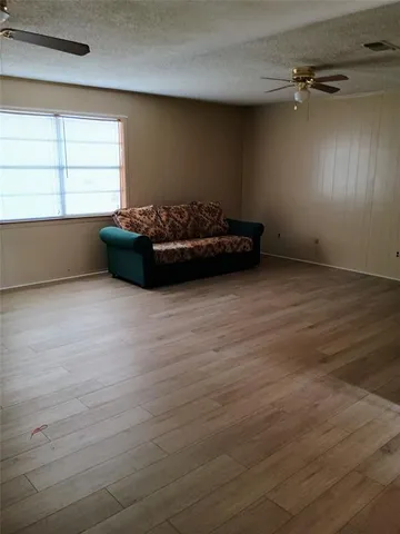 en empty room with windows