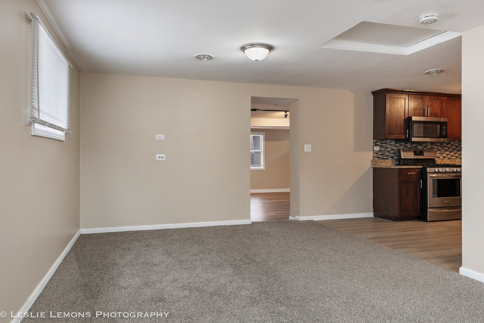 4949 Paxton Road Oak Lawn, IL 60453 - Photo 7 of 29 a view of kitchen with refrigerator and wooden floor