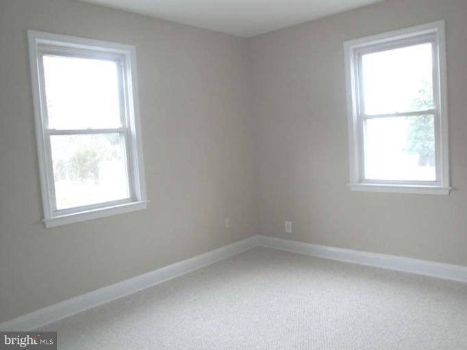 9702 Harford Road Baltimore, MD 21234 - Photo 12 of 17 an empty room with a window