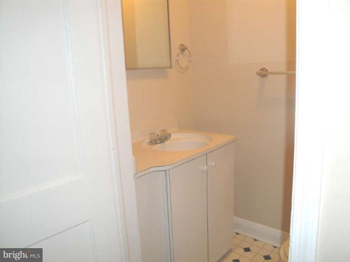 9702 Harford Road Baltimore, MD 21234 - Photo 17 of 17 a bathroom with a sink and vanity