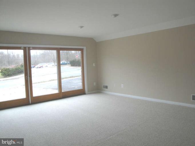 9702 Harford Road Baltimore, MD 21234 - Photo 9 of 17 a view of empty room with window