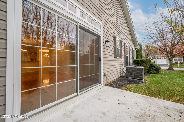 a view of a backyard with a fence
