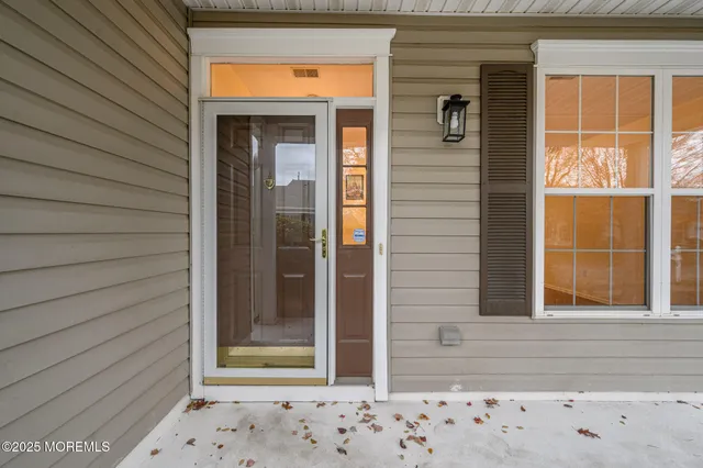 a view of a door and a window
