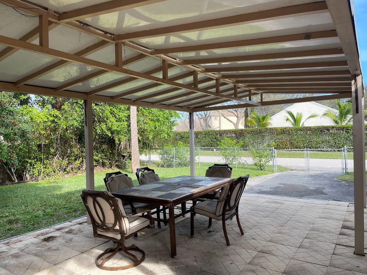 1001 Comanche Street Jupiter, FL 33458 - Photo 5 of 35 Covered Back Patio