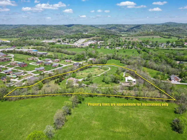 a view of a golf course with a lake view