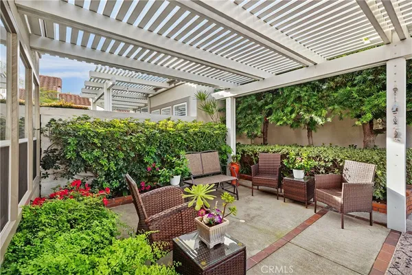 a outdoor living space with furniture and garden view
