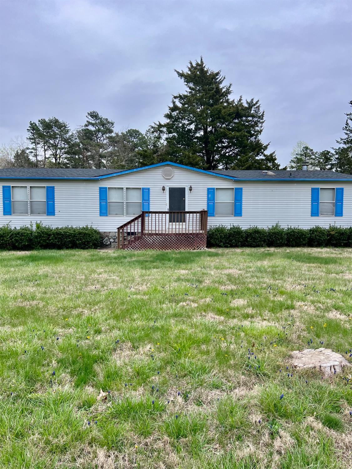 5507 Wards Road Evington, VA 24550 - Photo 1 of 15 a view of a house with a yard and plants