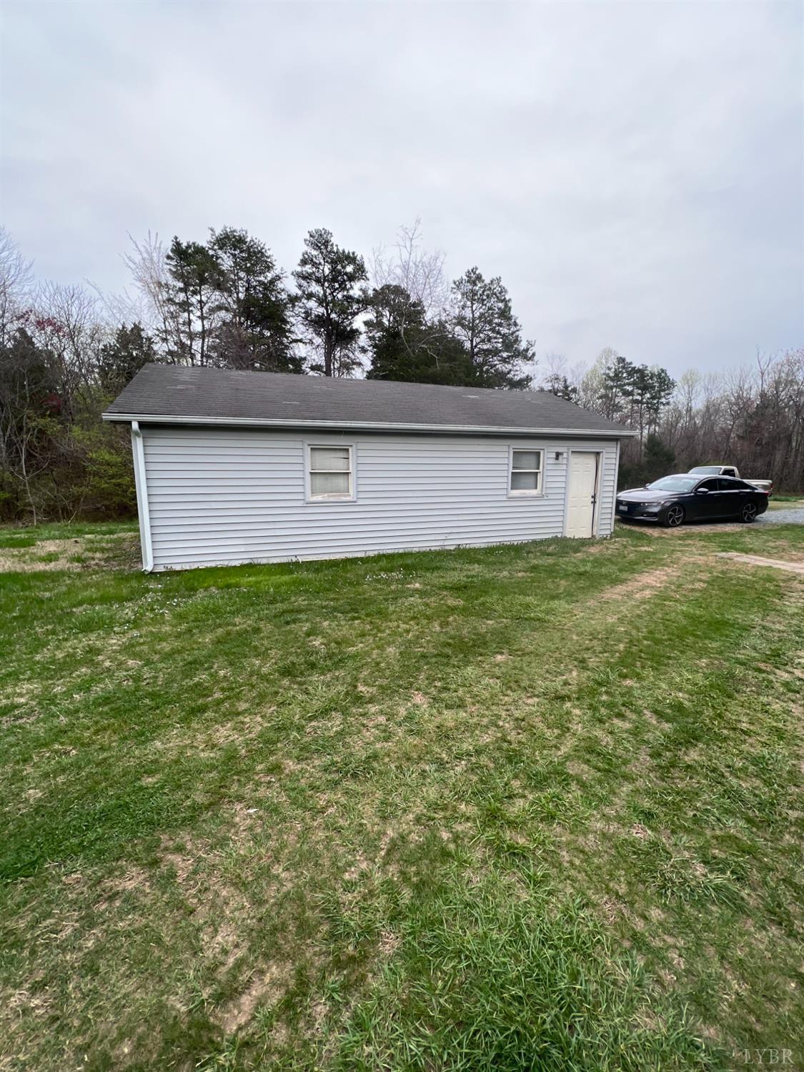 5507 Wards Road Evington, VA 24550 - Photo 4 of 15 a house with garden in front of it
