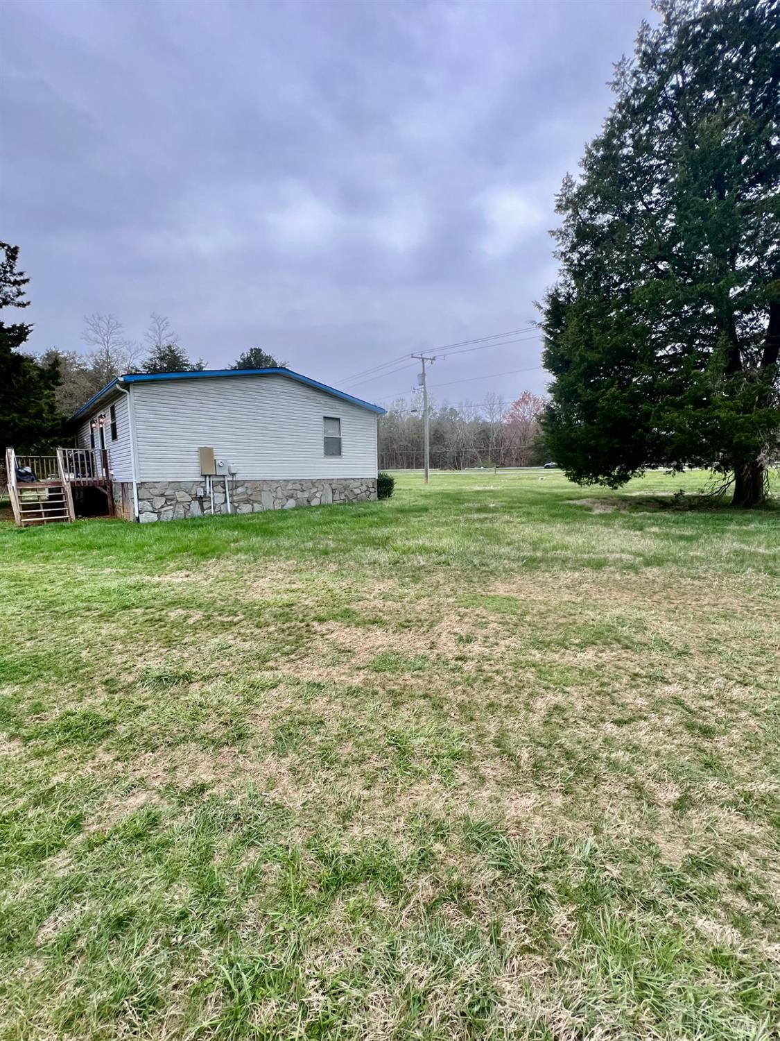 5507 Wards Road Evington, VA 24550 - Photo 6 of 15 a fire hydrant in front of a house