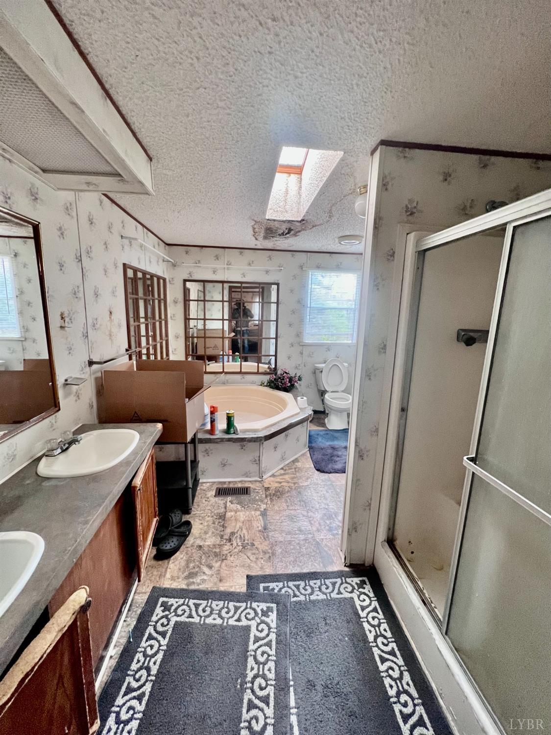 5507 Wards Road Evington, VA 24550 - Photo 10 of 15 a living room with furniture and a rug