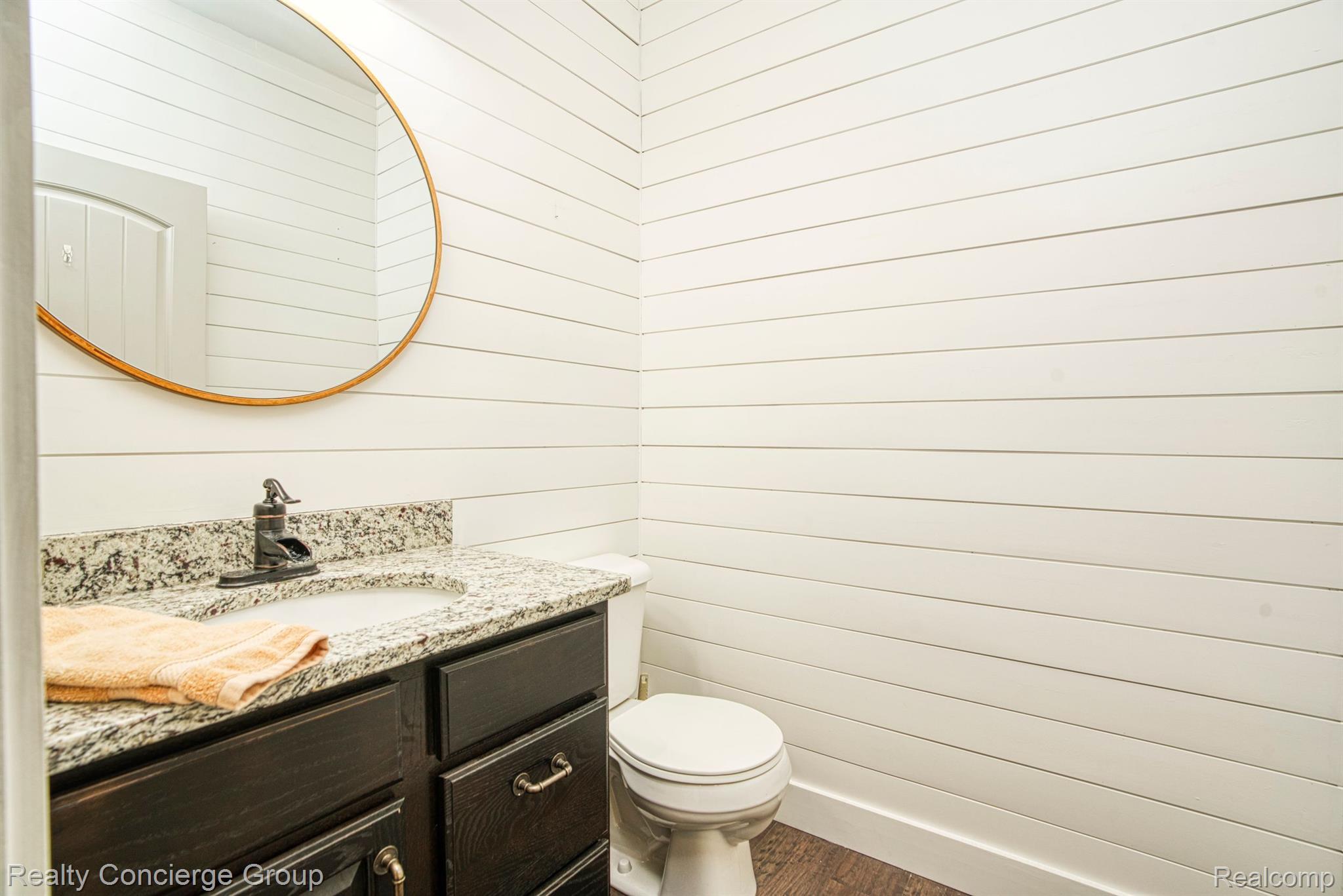 1171 Cannonade Loop Howell, MI 48843 - Photo 8 of 27 Immaculate 1/2 bath w/ shiplap design