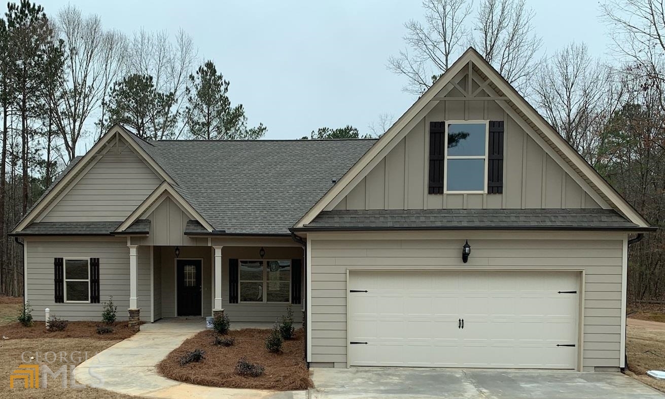 207 Trinity Chase Carrollton, GA 30117 - Photo 1 of 1 a front view of a house with entertaining space