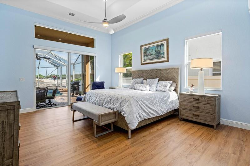 8235 Southwest 51st Street Cooper City, FL 33328 - Photo 14 of 29 Huge primary bedroom with patio access!