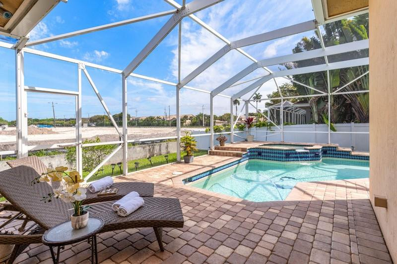 8235 Southwest 51st Street Cooper City, FL 33328 - Photo 25 of 29 Room to roam on your gorgeous lanai!