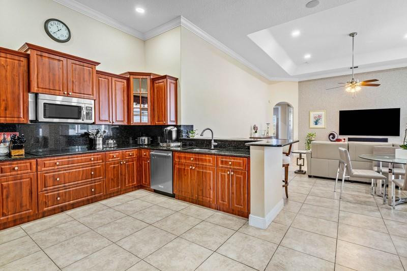 8235 Southwest 51st Street Cooper City, FL 33328 - Photo 8 of 29 42" cabinetry, granite countertops!