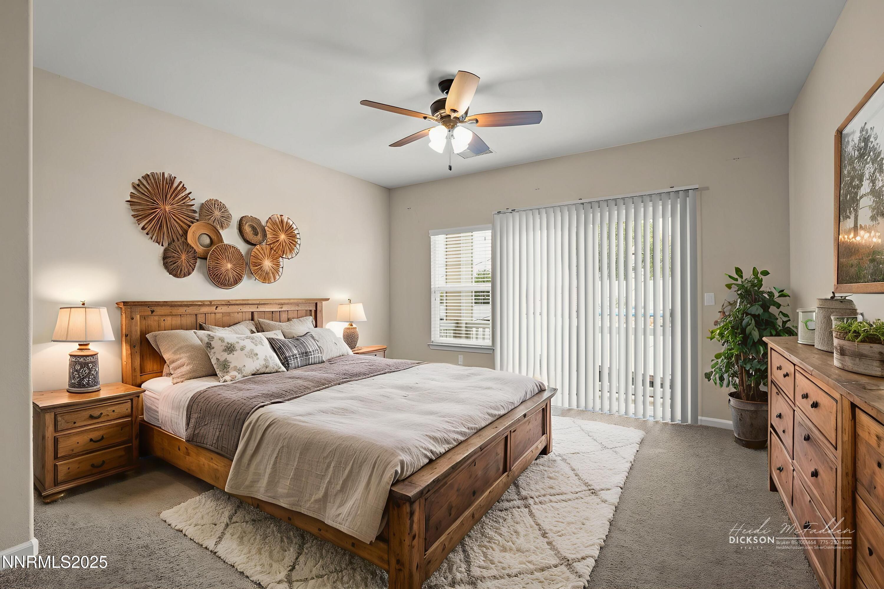 2040 Alamo Square Way Reno, NV 89509 - Photo 12 of 39 a spacious bedroom with a bed and a chandelier
