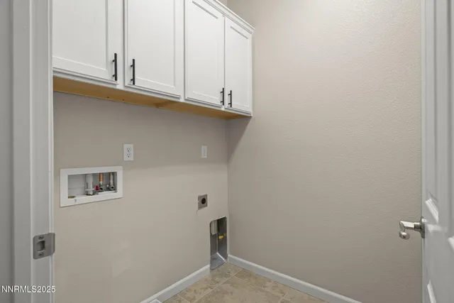 a view of cabinets and wooden floor