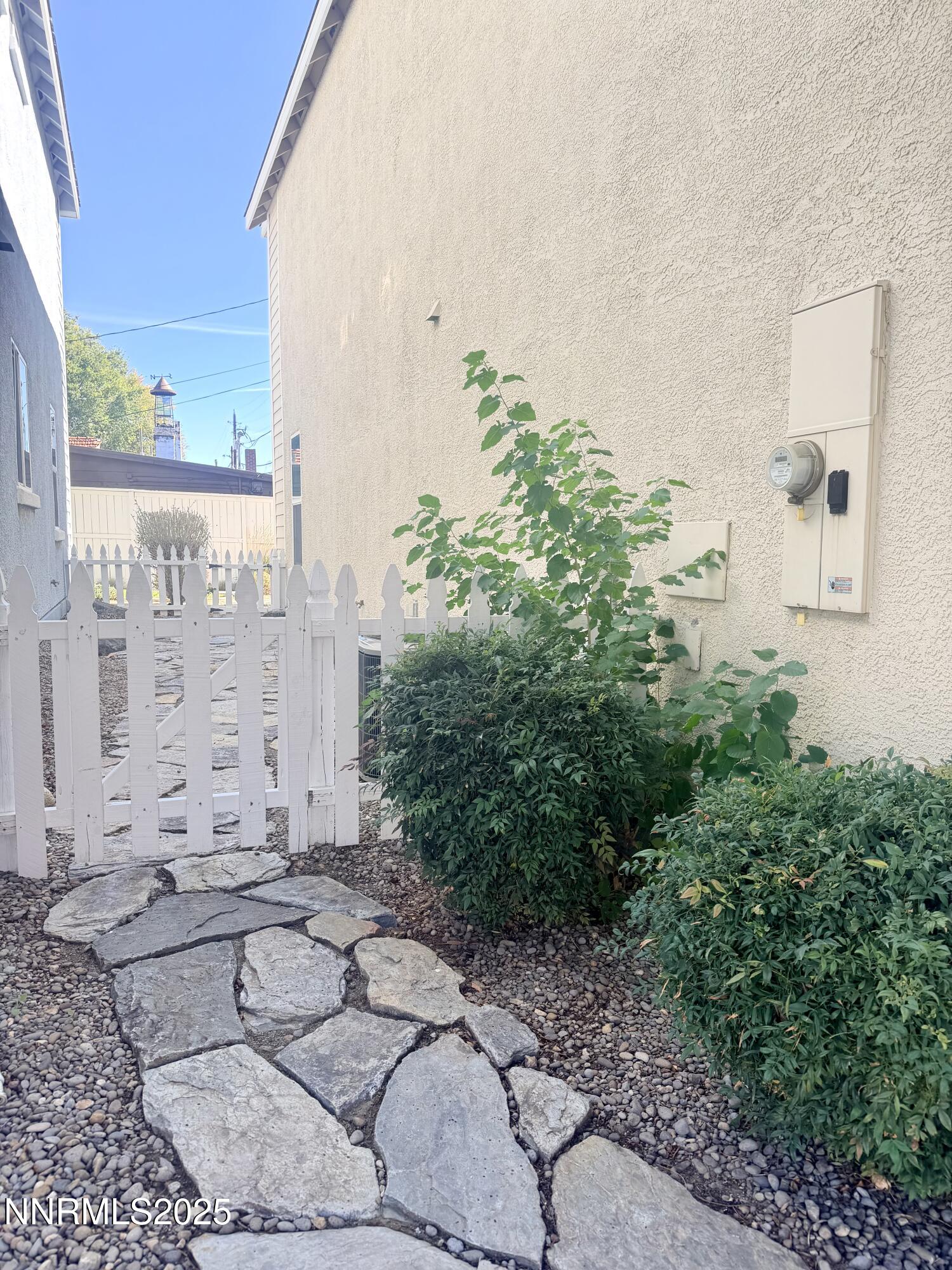 2040 Alamo Square Way Reno, NV 89509 - Photo 25 of 39 a view of a potted plants in back of a house