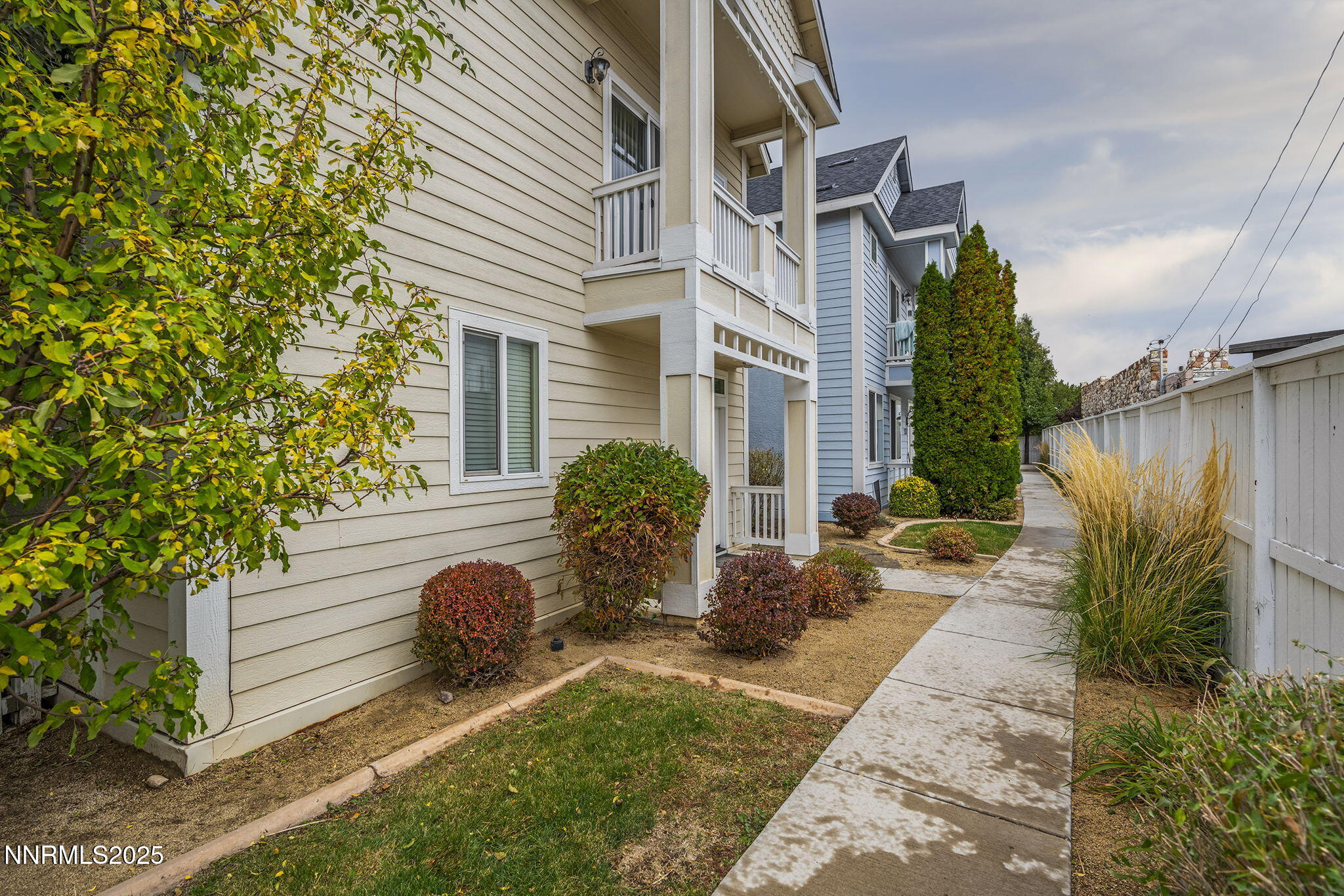 2040 Alamo Square Way Reno, NV 89509 - Photo 3 of 39 a view of a house with backyard and a garden