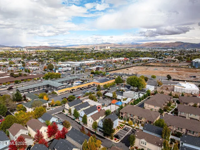 an aerial view of a city with lots of residential buildings