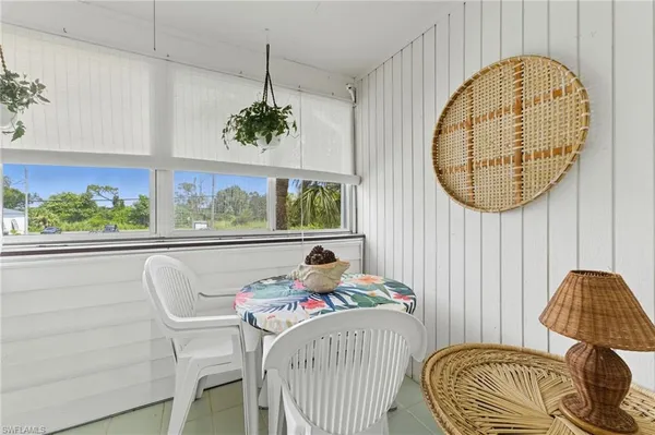 a room with furniture and a window