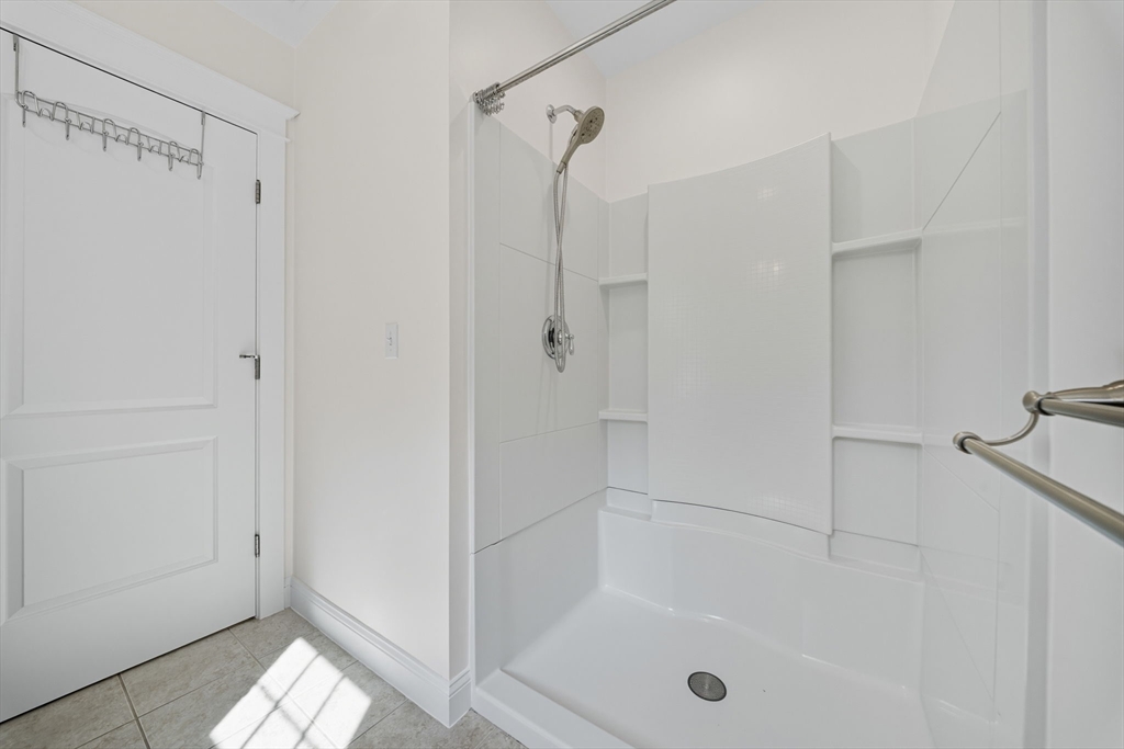 3 Spotted Turtle Path, Unit 242 Canton, MA 02021 - Photo 14 of 36 a bathroom with a bathtub