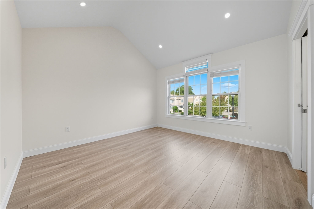 3 Spotted Turtle Path, Unit 242 Canton, MA 02021 - Photo 20 of 36 wooden floor in an empty room with a window