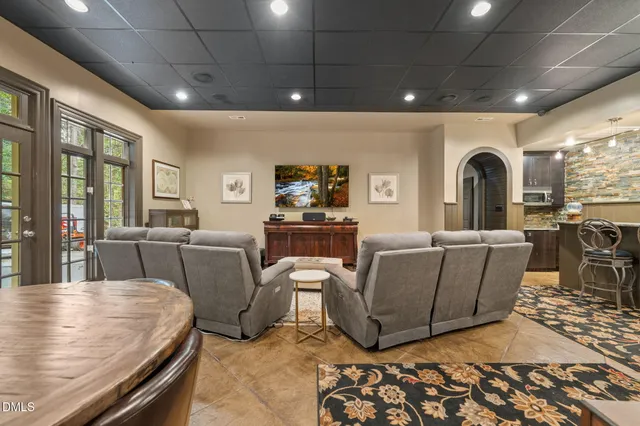 a large spacious bathroom with a large tub shower and sink
