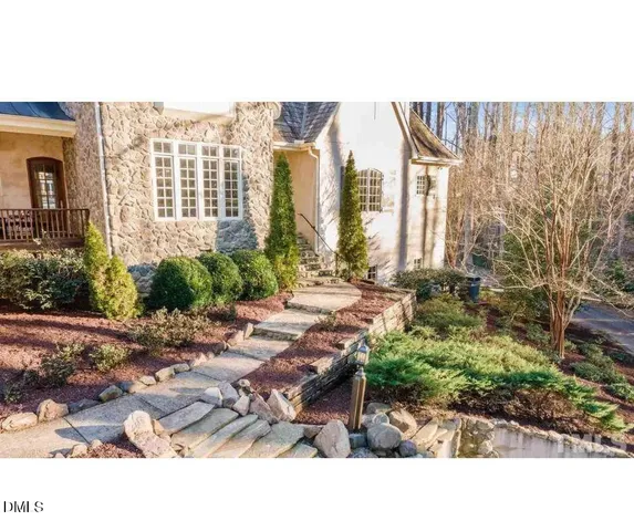 a black and white photo of a house