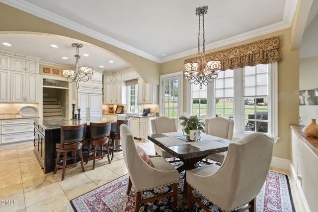 a living room with furniture a lamp and a fireplace