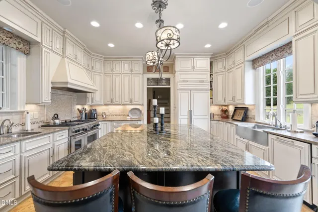 a bathroom with a toilet a sink and vanity