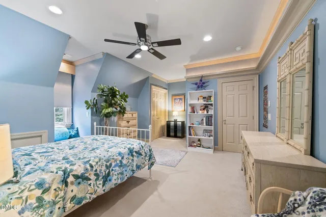 a bathroom with double vanity sink and a mirror