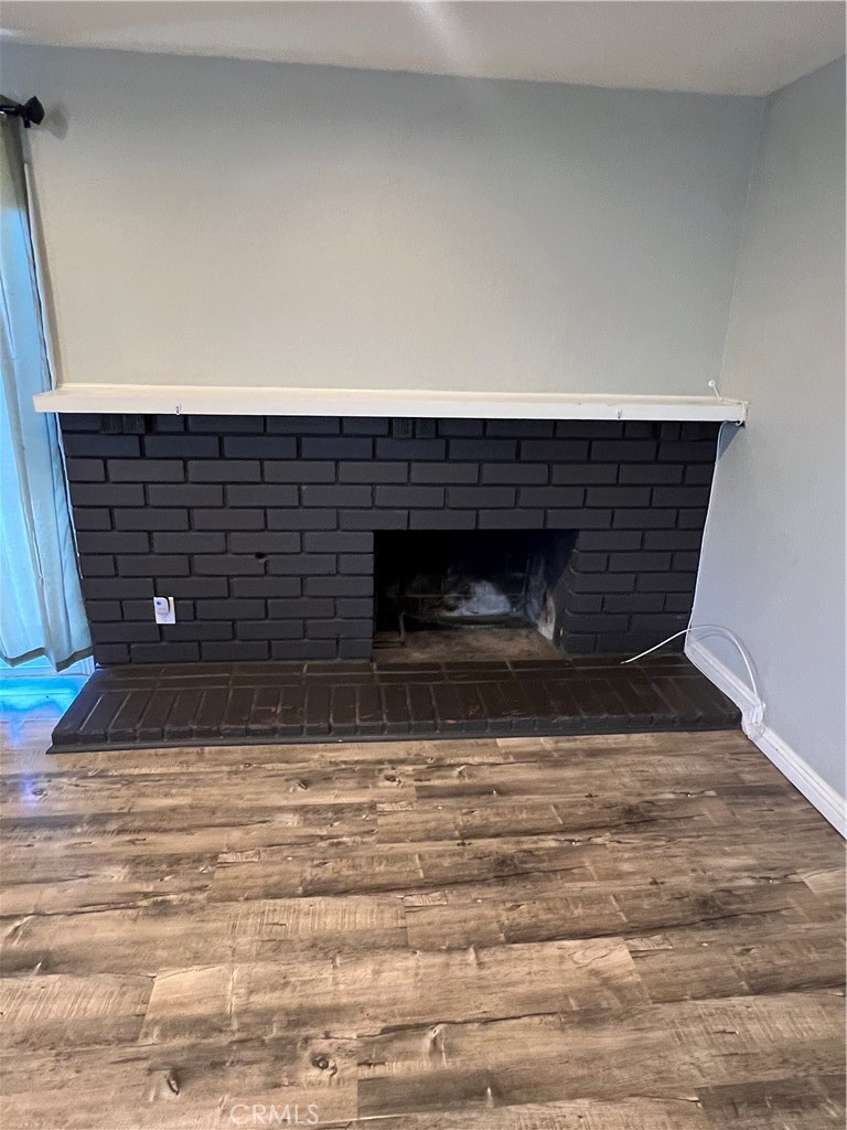 866 North Eucalyptus Avenue Rialto, CA 92376 - Photo 6 of 20 a fireplace with a rug