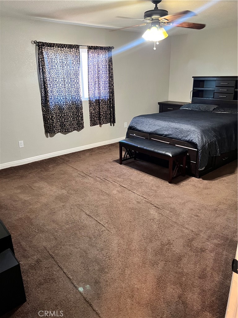866 North Eucalyptus Avenue Rialto, CA 92376 - Photo 7 of 20 a bedroom with a bed and window
