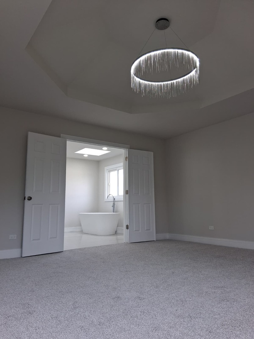 19013 Amlin Lane Country Club Hills, IL 60478 - Photo 14 of 20 a bathroom with a sink and a mirror
