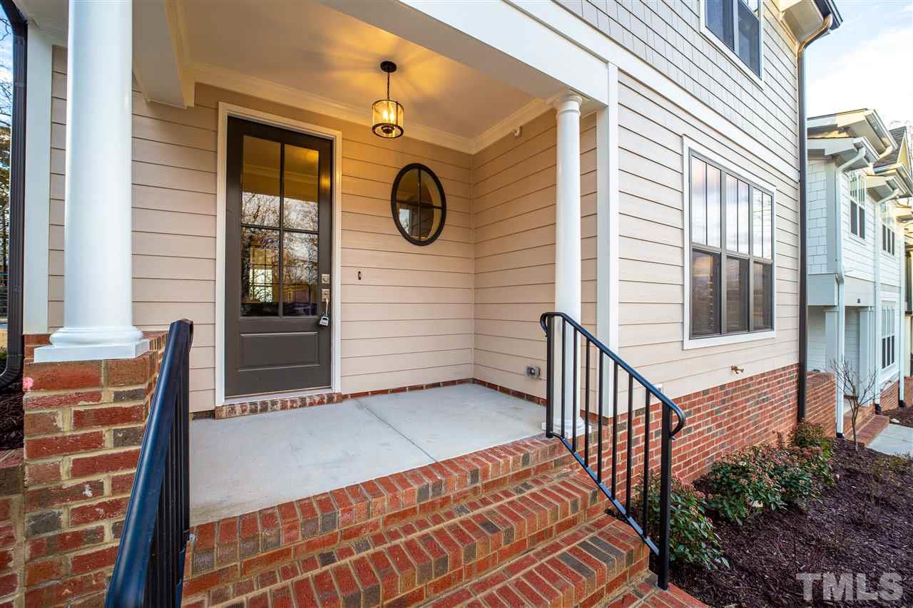 507 Hamilton Cottage Way Raleigh, NC 27605 - Photo 2 of 30 a view of front door and porch