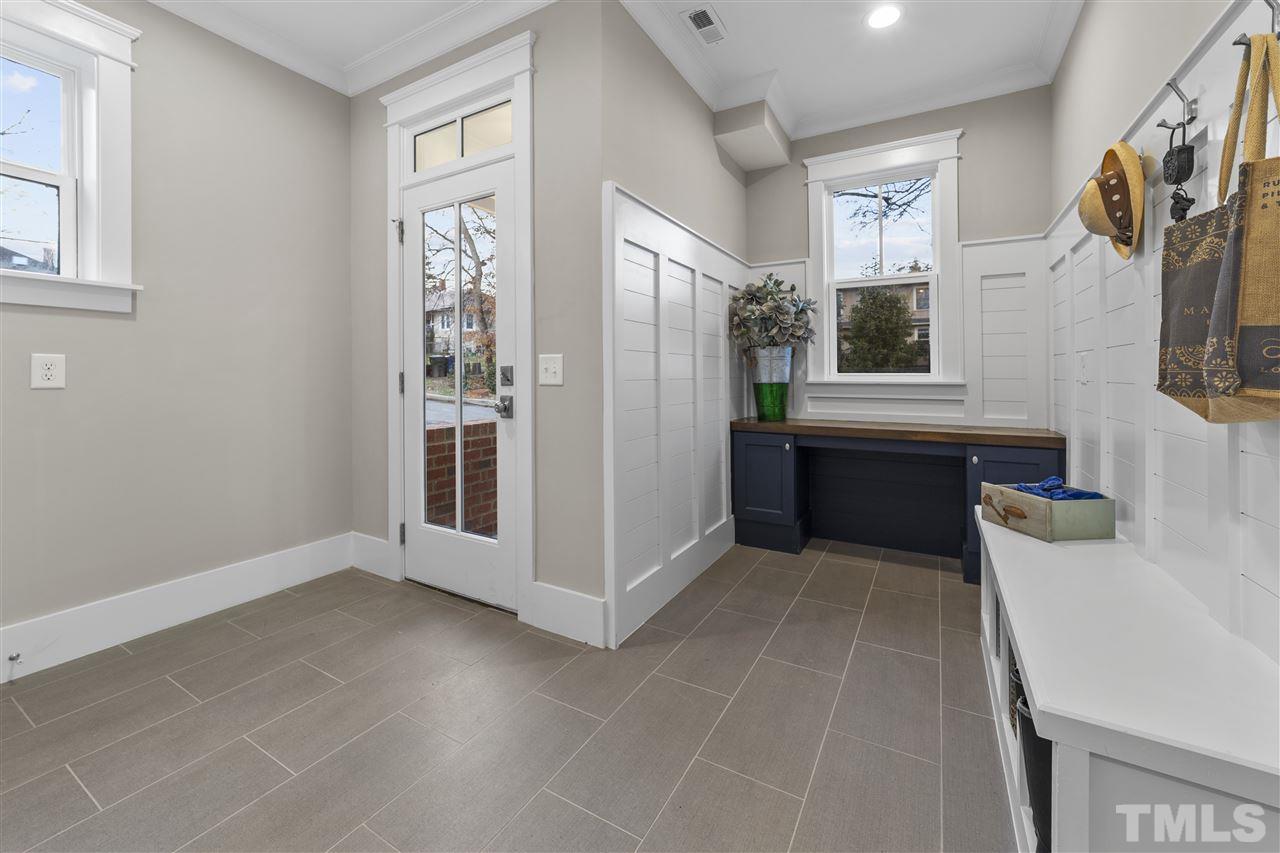 507 Hamilton Cottage Way Raleigh, NC 27605 - Photo 12 of 30 a view of a kitchen with furniture and window