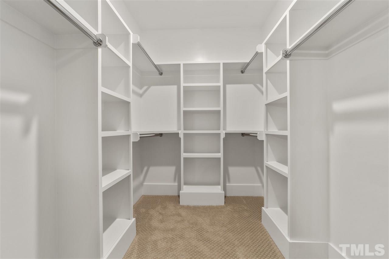 507 Hamilton Cottage Way Raleigh, NC 27605 - Photo 19 of 30 a view of an empty walk in closet