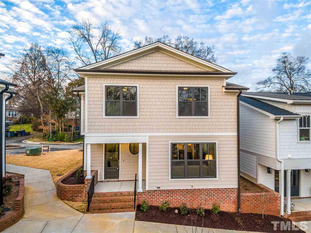 507 Hamilton Cottage Way Raleigh, NC 27605 - Photo 3 of 30 a front view of a house with garden