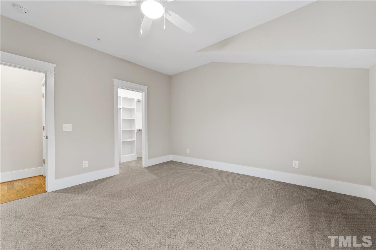 507 Hamilton Cottage Way Raleigh, NC 27605 - Photo 23 of 30 a view of an empty room with a window