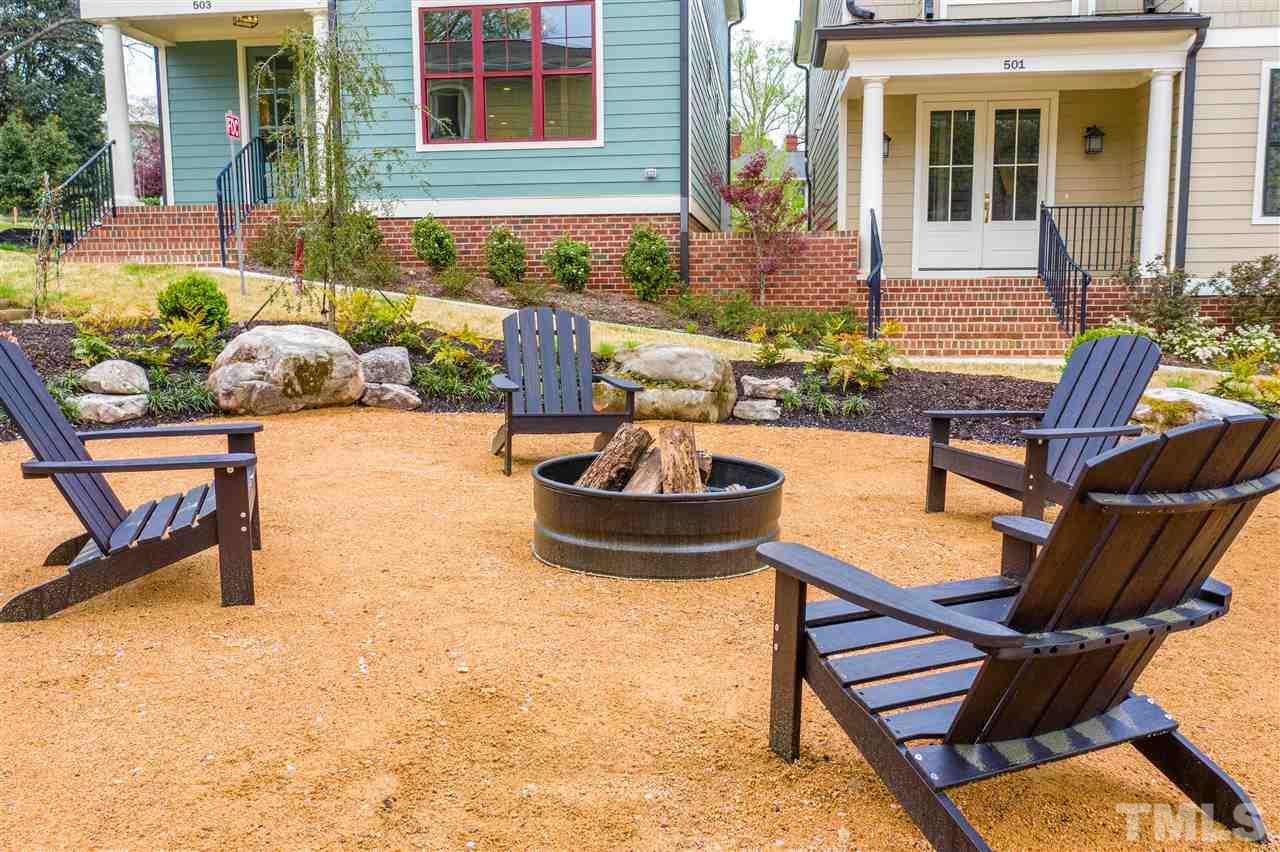 507 Hamilton Cottage Way Raleigh, NC 27605 - Photo 28 of 30 a building outdoor space with patio furniture