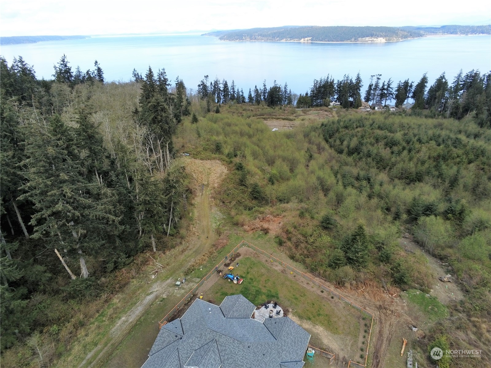 3282 Water View Drive Langley, WA 98260 - Photo 15 of 23 a view of a lake with houses in the back