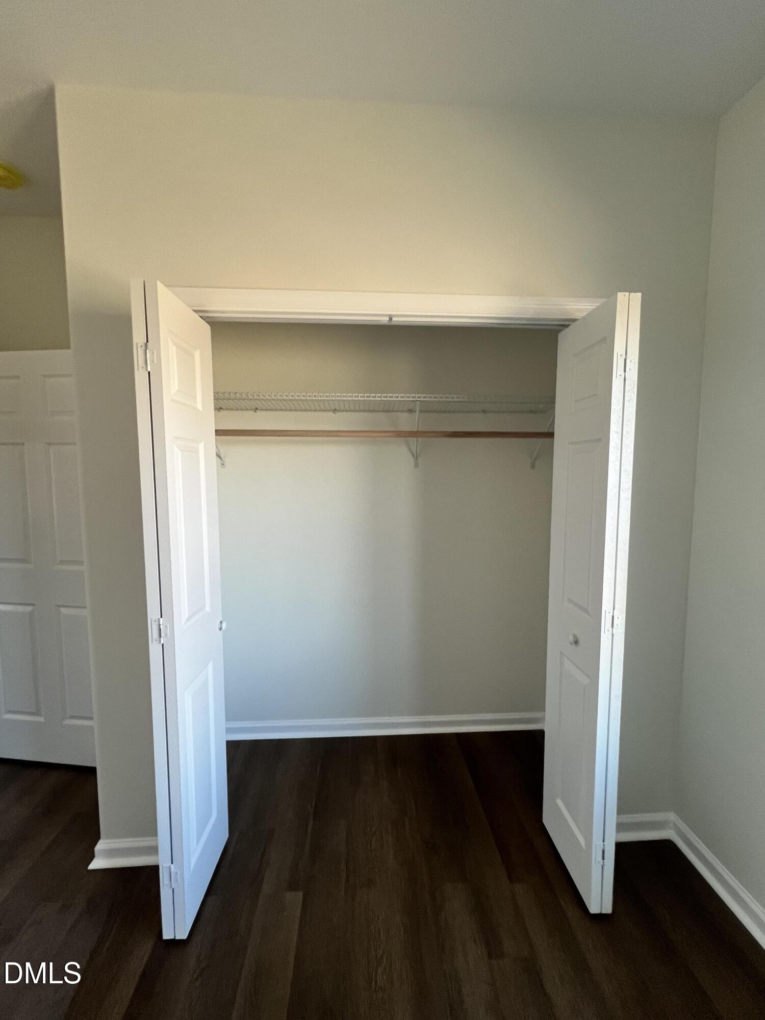 500 Jones Lester Road Roxboro, NC 27574 - Photo 6 of 17 an empty room with wooden floor and closet