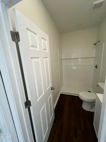 a bathroom with a sink and toilet