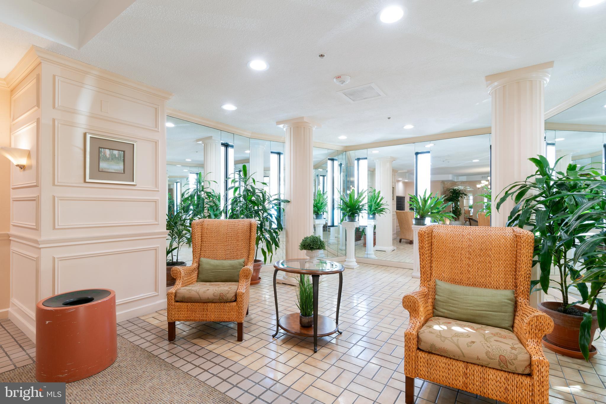 15115 Interlachen Drive, Unit 3607 Silver Spring, MD 20906 - Photo 27 of 37 a outdoor living space with furniture and a potted plant
