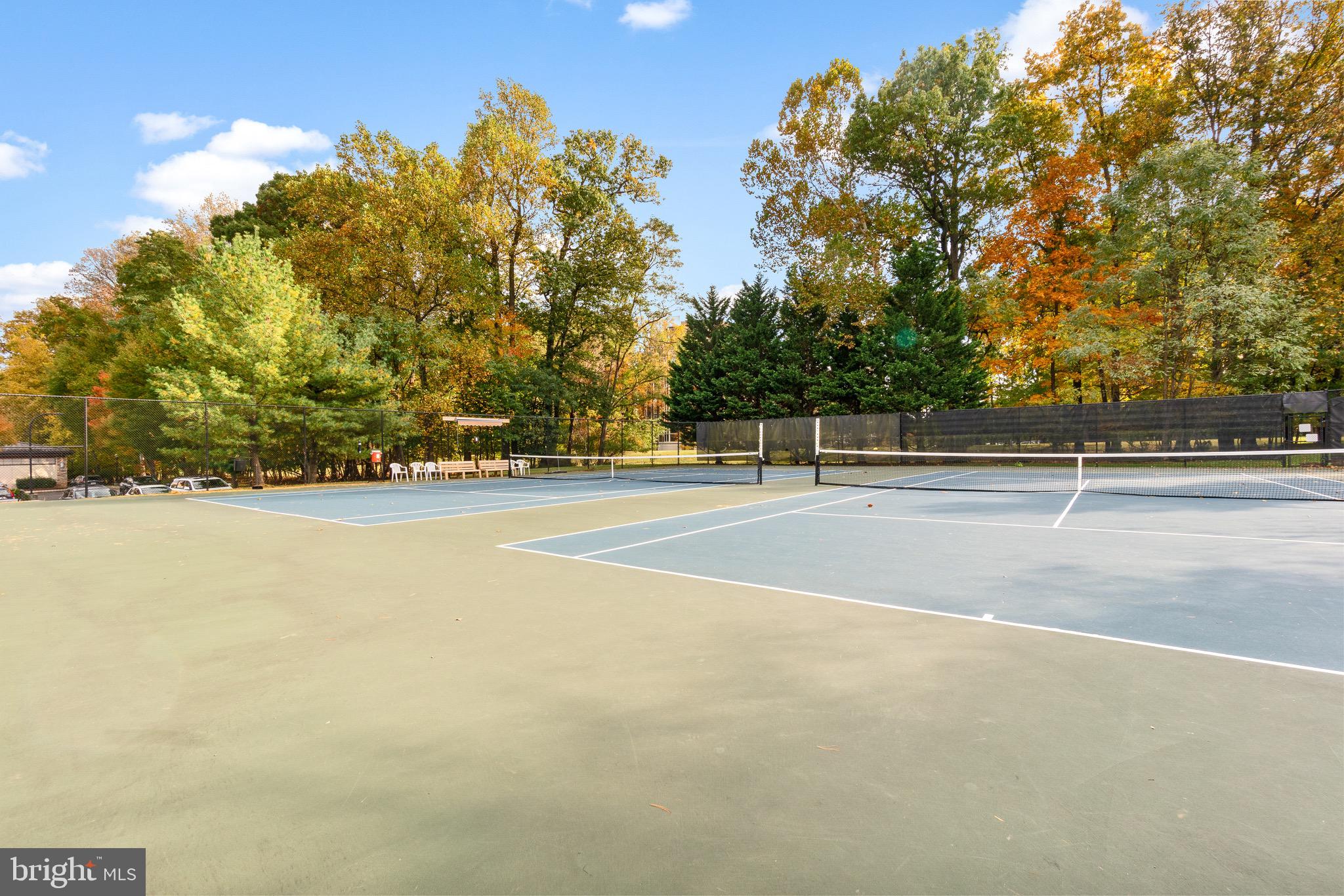15115 Interlachen Drive, Unit 3607 Silver Spring, MD 20906 - Photo 28 of 37 a view of a tennis court